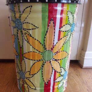 A rainbow-themed can with colorful huge flowers