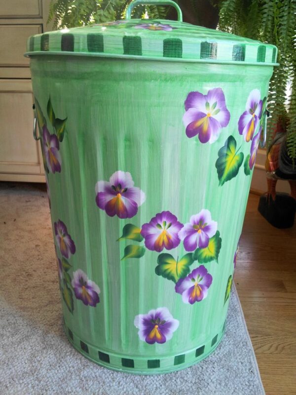 A light green can with purple flowers