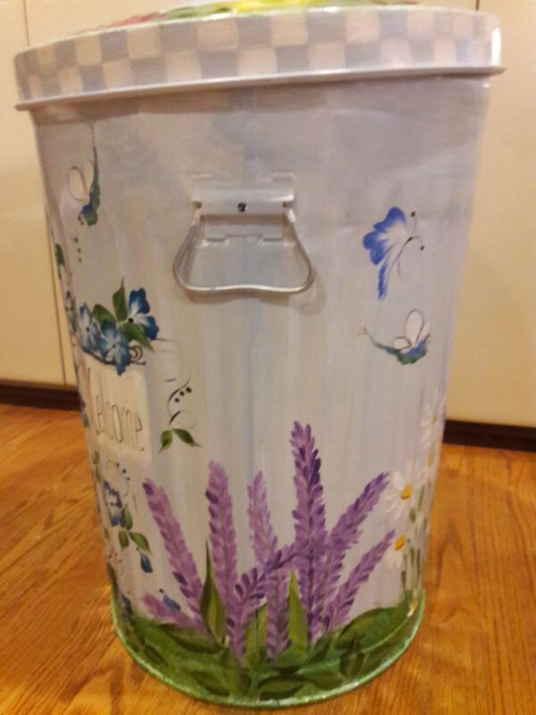 A can with lavenders and blue butterflies