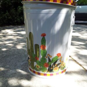 30 Gallon bright white with cactus, yellow, white, orange flowers. The Painted Can