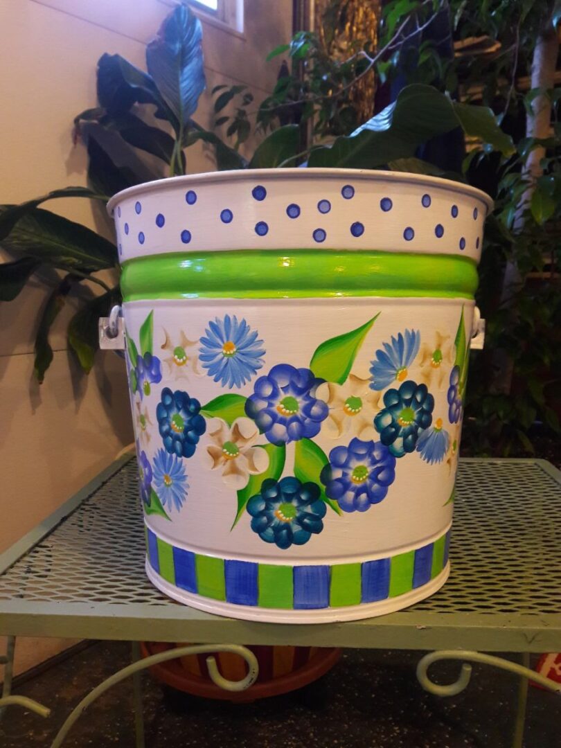 6 Gallon bright white, sunflowers, greenery, leaf trim lid rim and can base. The Painted Can