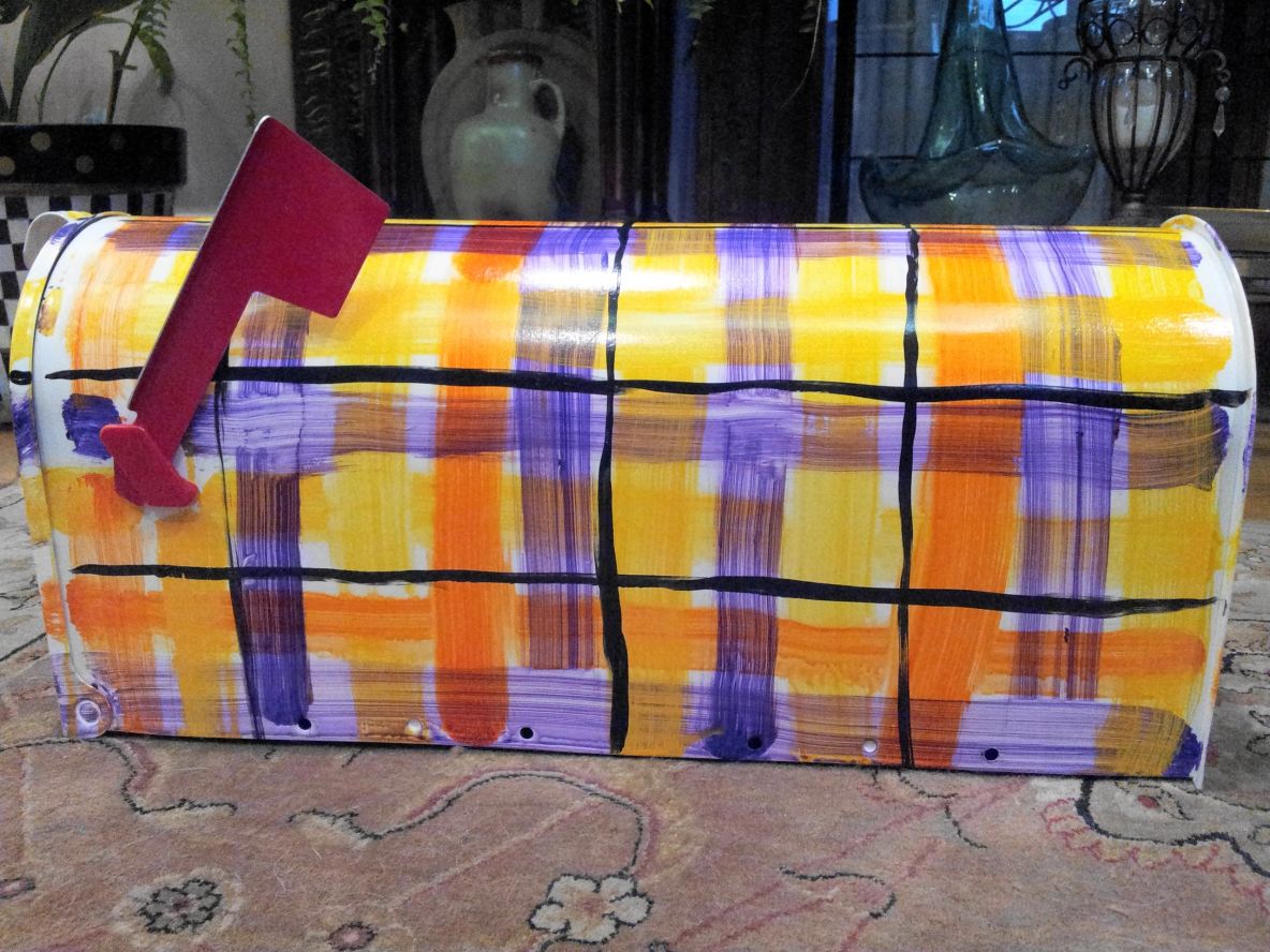Mailbox bright plaid orange, purple, yellow, black. The Painted Can