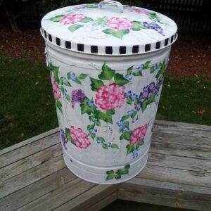 30 Gallon bright white with vibrant floral, greenery, black checked lid. The Painted Can
